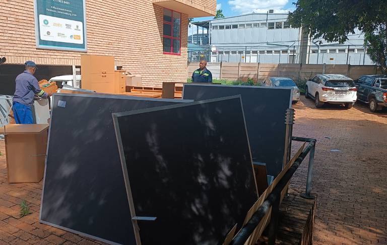 JET Education Services donates office furniture and equipment to schools in Johannesburg